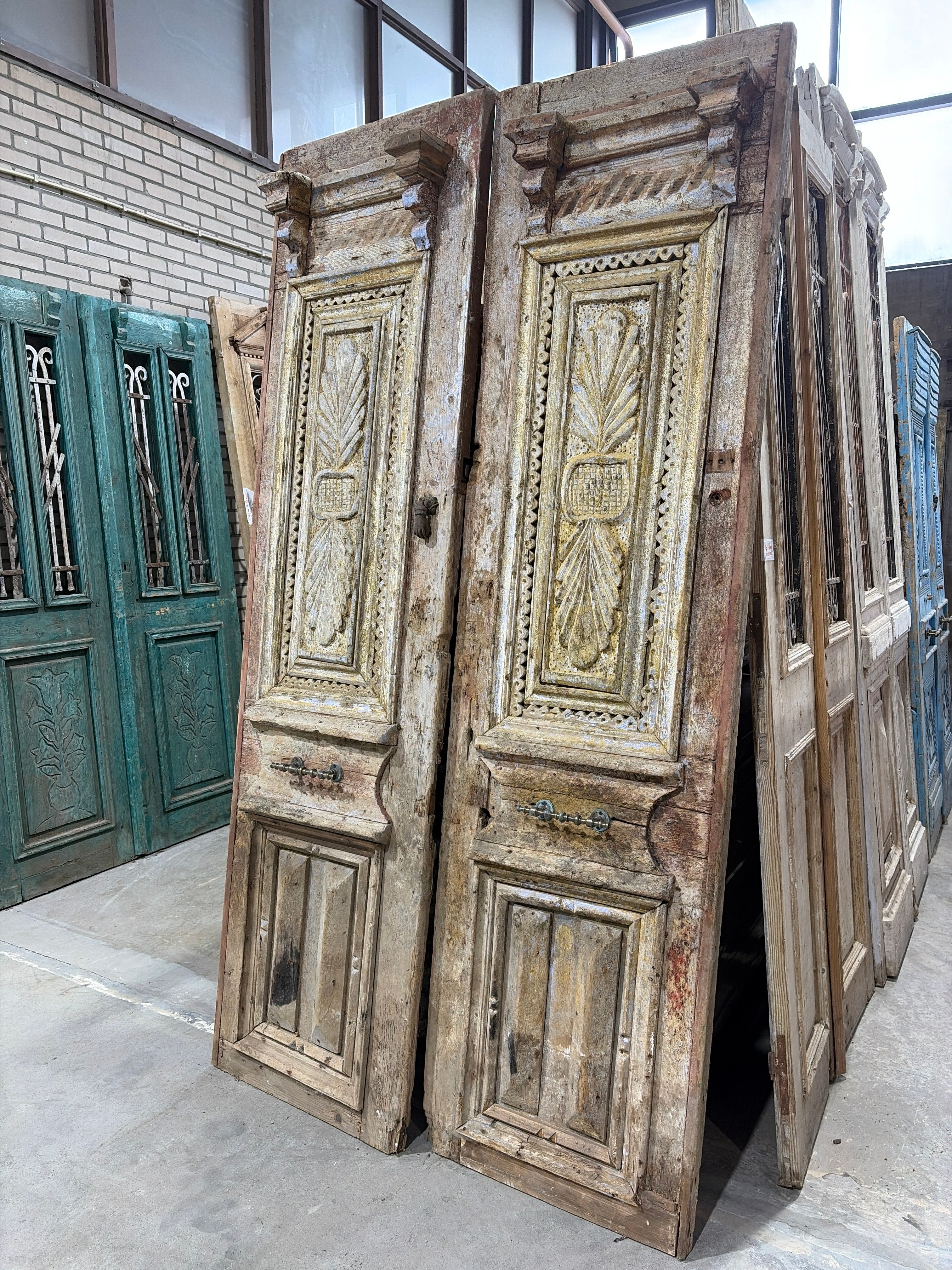 Antique wooden door with hand-carved details