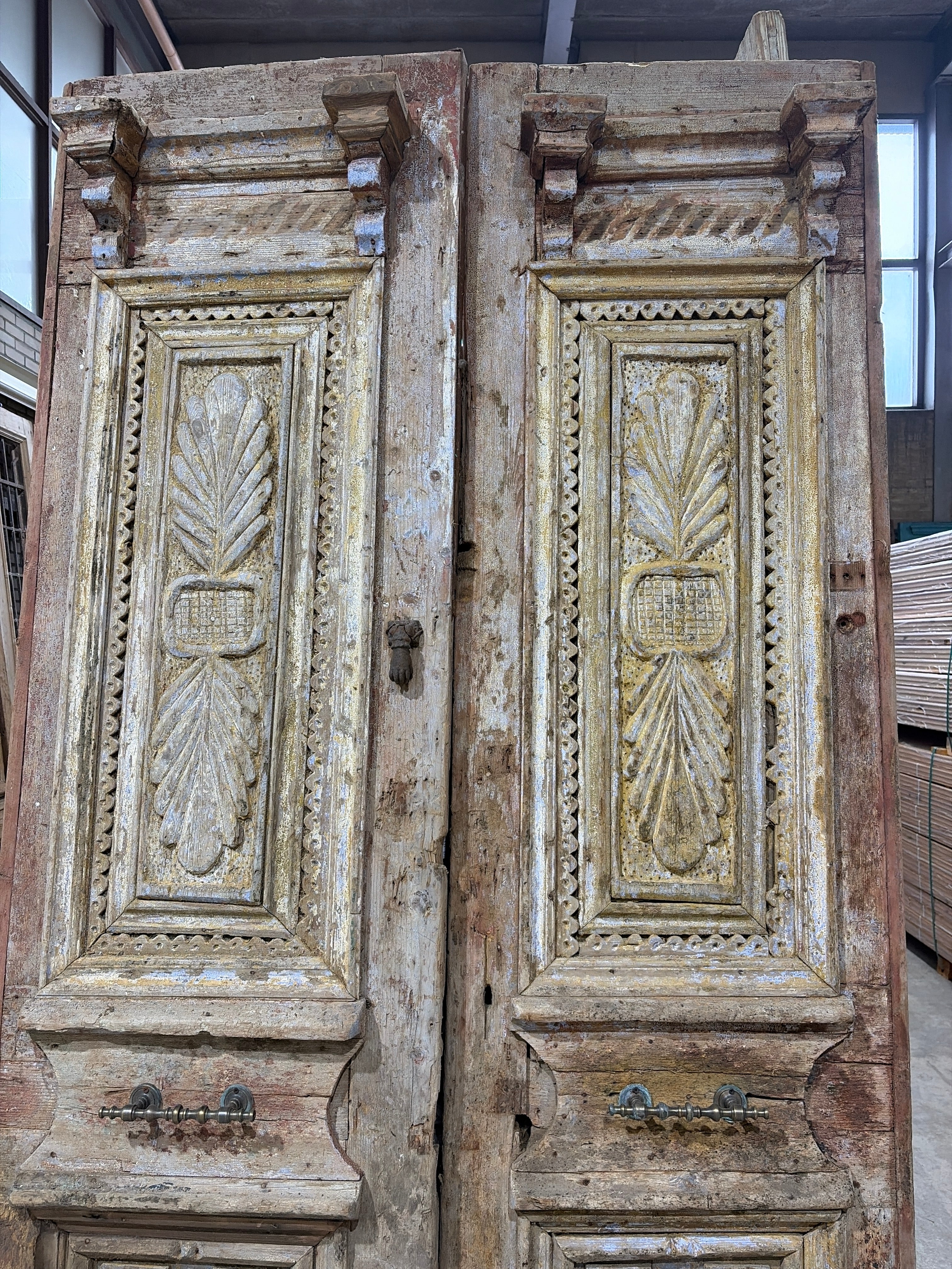 Antique wooden door with hand-carved details