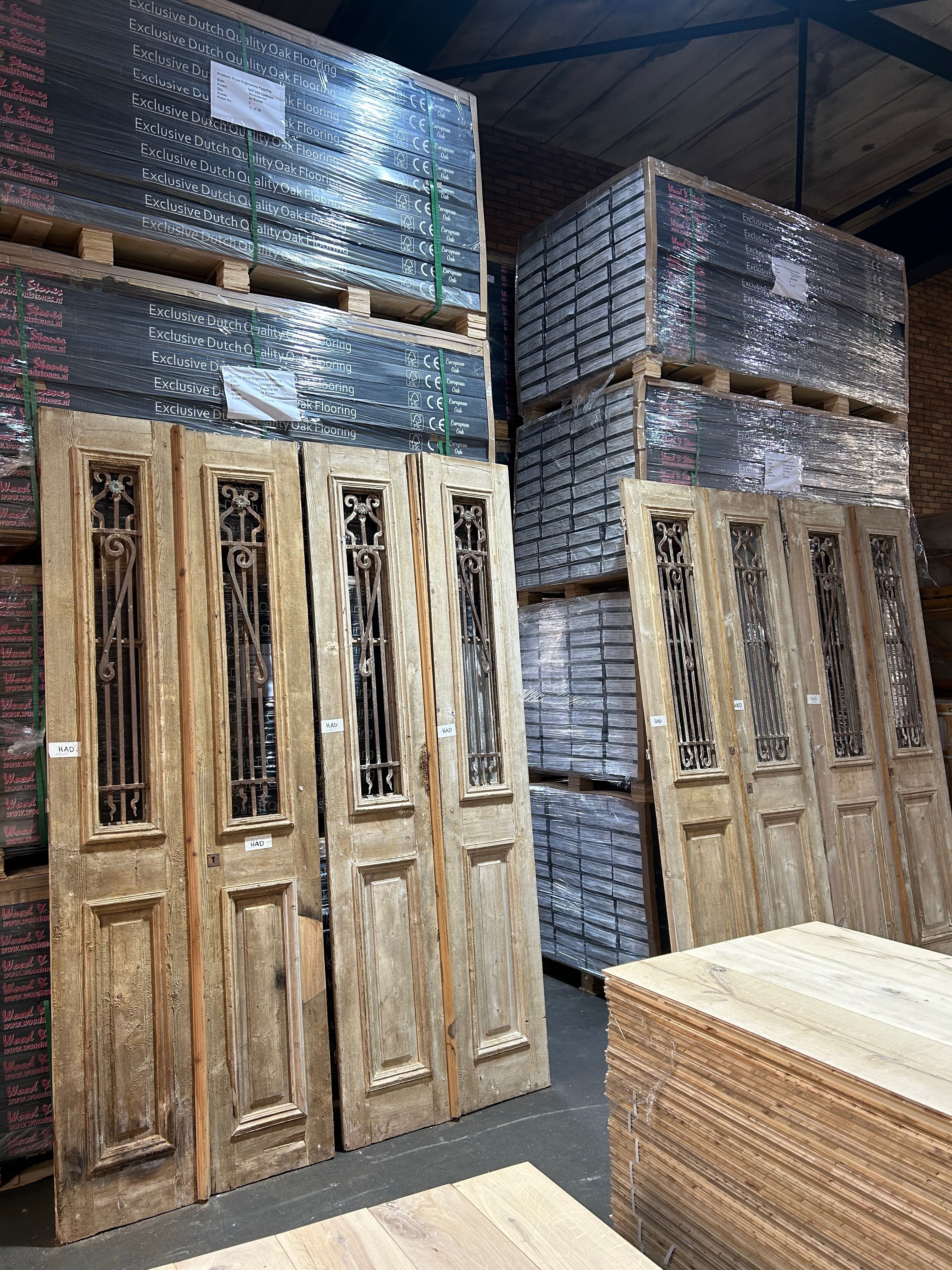 Antique double wooden doors with original patina and historic character